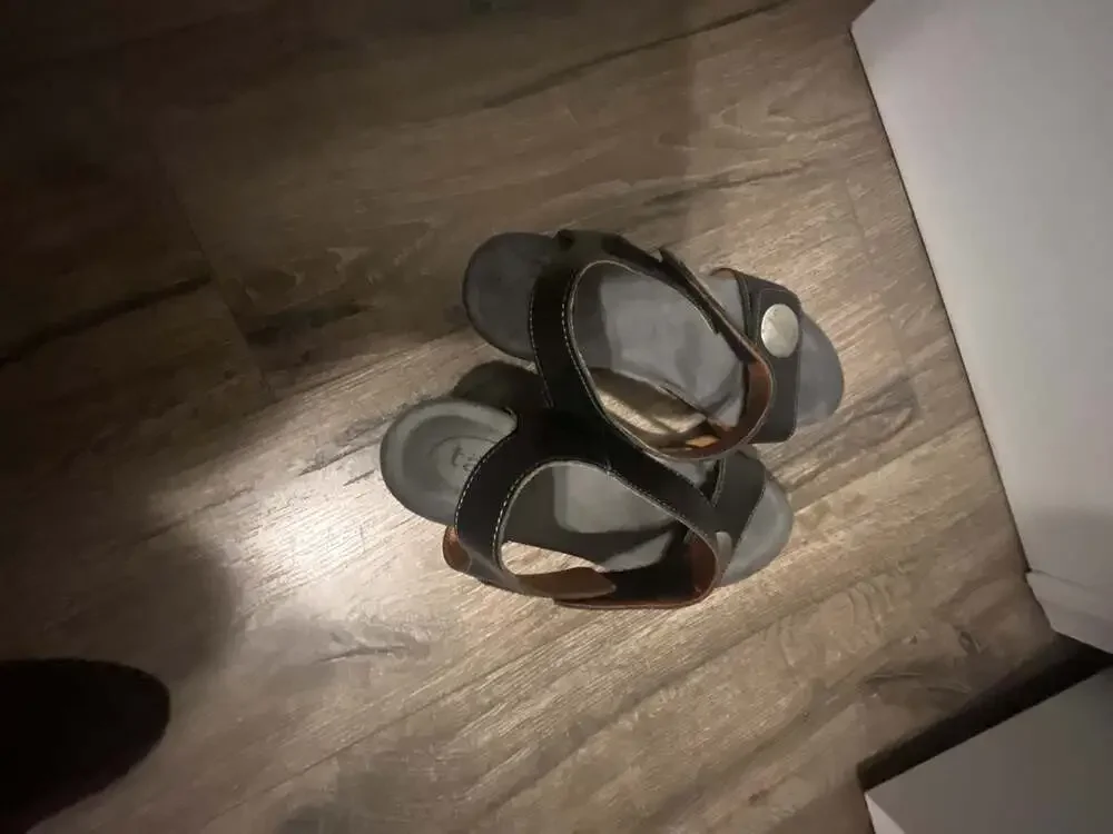 Taos Black Leather Carousel Wedge Sandals With Metallic Accent